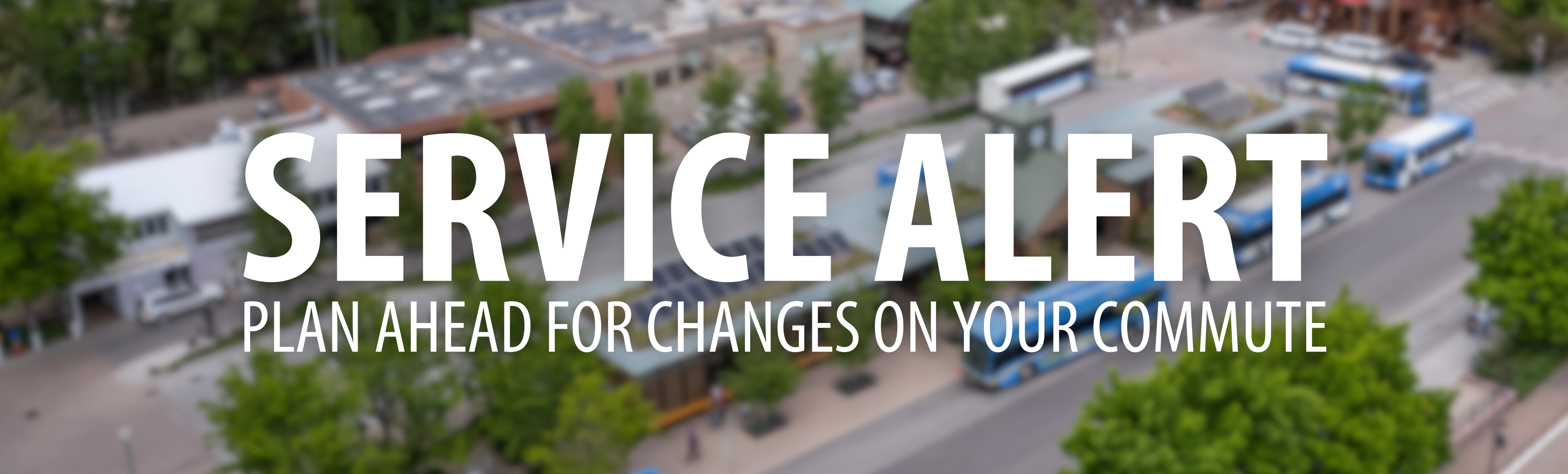 Blurred background image of Rubey Park Transit Center with overlay text that reads: "SERVICE ALERT: Plan ahead for changes on your commute."