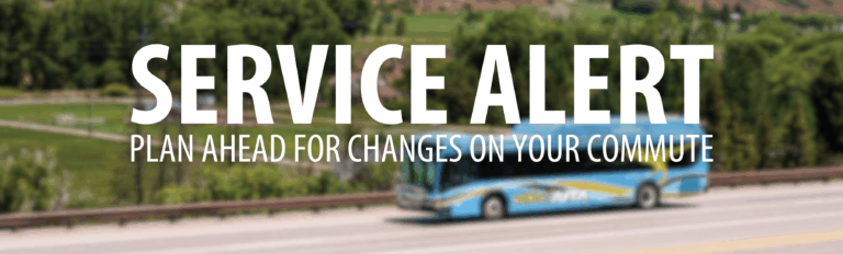 Image of a VelociRFTA driving down the Roaring Fork Valley, with green mountains in the background
