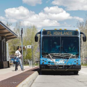 Riders boarding the RFTA FL Flyer bus at the Brush Creek Park & Ride