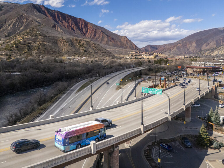 Ride Glenwood bus traveling over the Grand Avenue Bridge