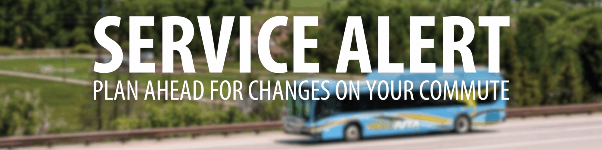 Image of a VelociRFTA driving down the Roaring Fork Valley, with green mountains in the background